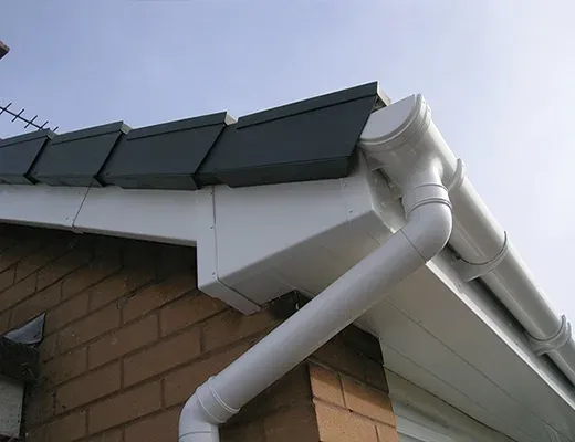 New black guttering and fascias fitted on a Bath house