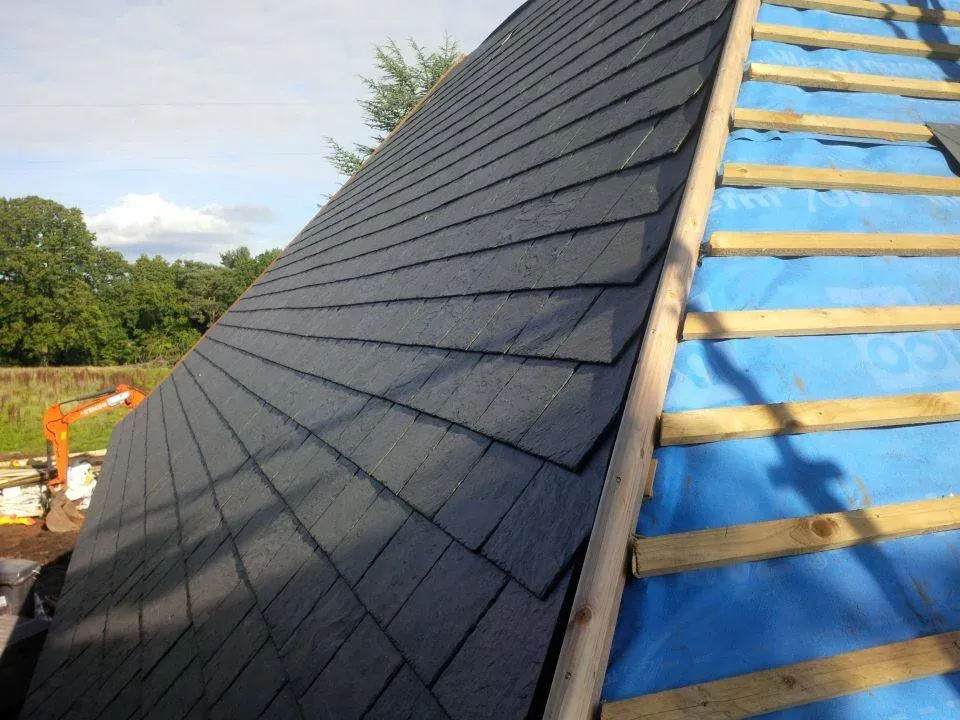 Full slate re-roof in progress by Majestic Roofing in Bath