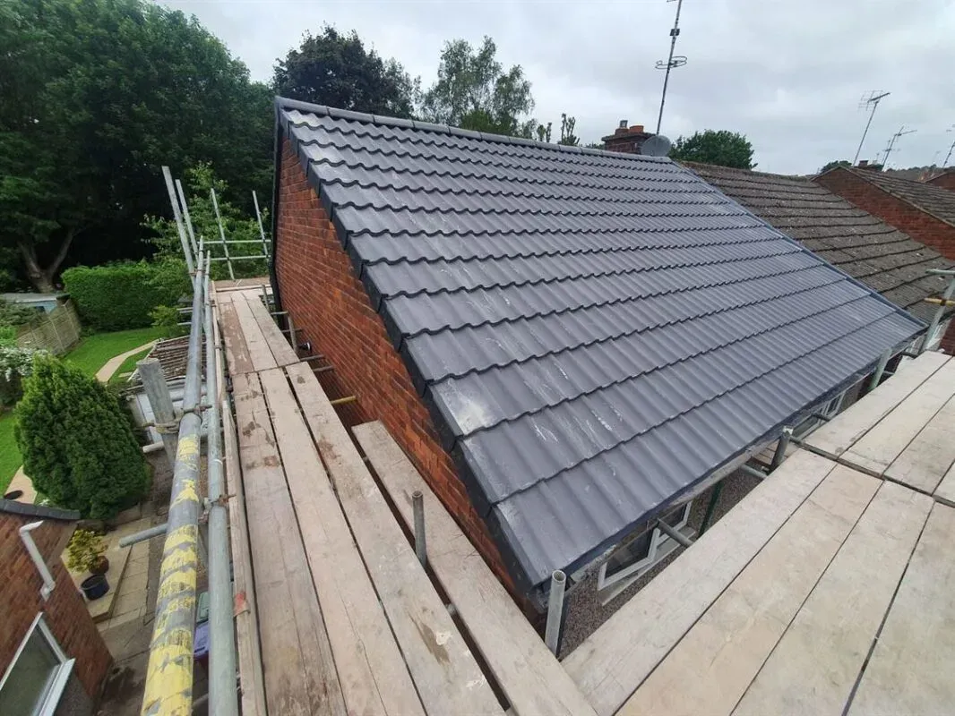 New grey tile roof fitted on a Bath home